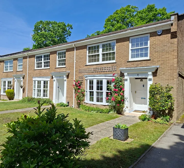 Terraced homes in Bransgore after exterior repainting and repairs